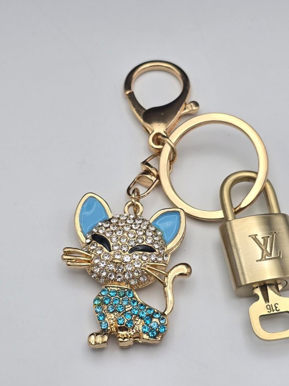 Louis Vuitton Gold Lock 🔑 Authentic LV Padlock + Unbranded Cat Bag Charm - Picture 8 of 8